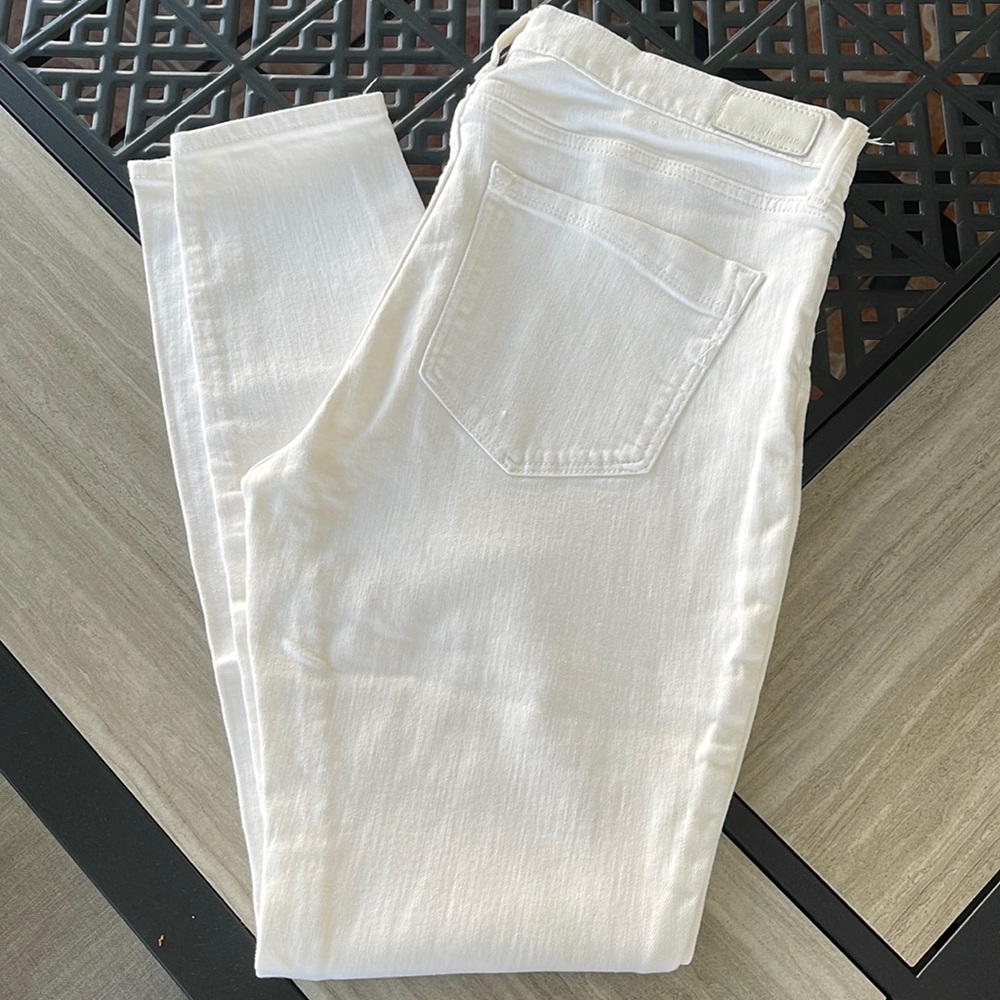 Woman’s white Express jeans